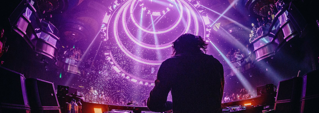 Omnia Nightclub Headline DJ With Purple Chandelier